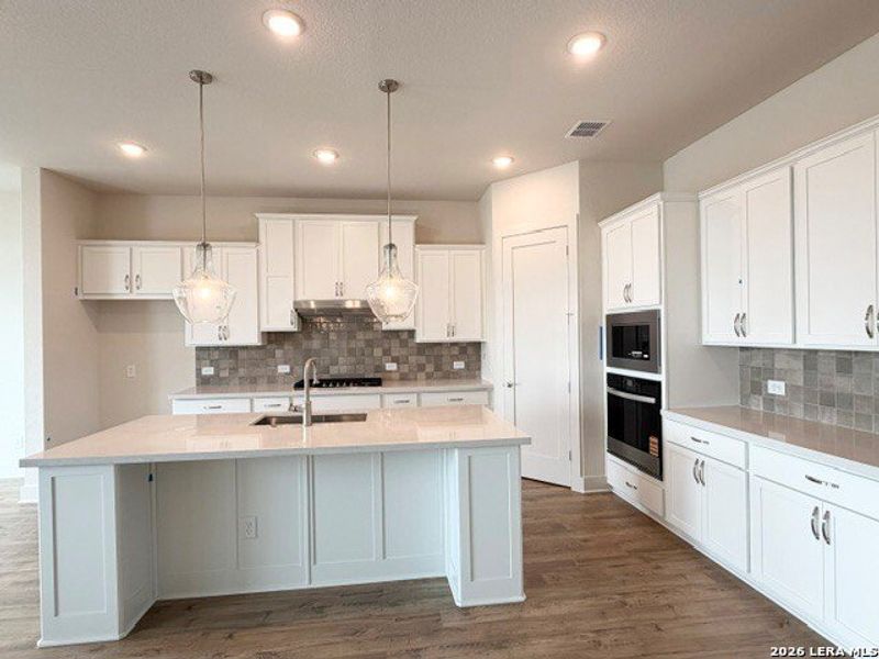 Furnished interior view inside a new home in Ladera - 50s, San Antonio (Image 6).