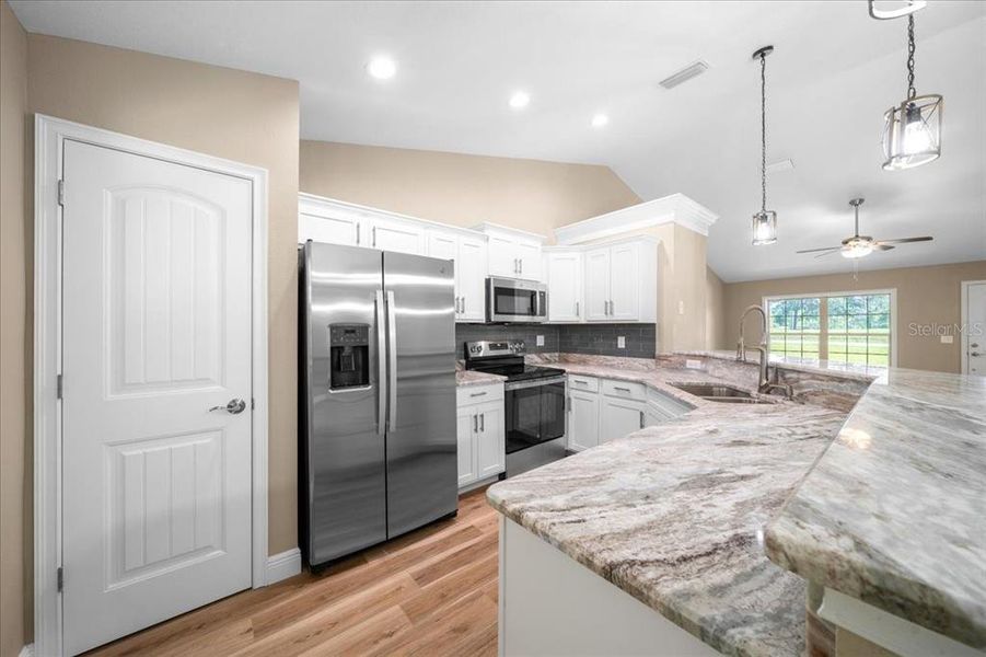 Furnished interior view inside a new home in , Dunnellon (Image 12).