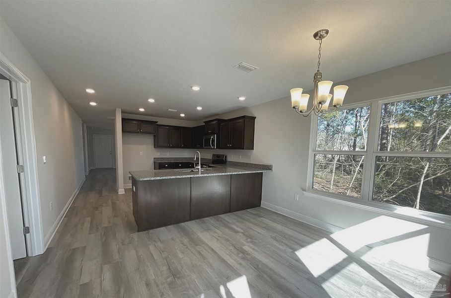 Furnished interior view inside a new home in Turtle Creek, Cantonment (Image 4).