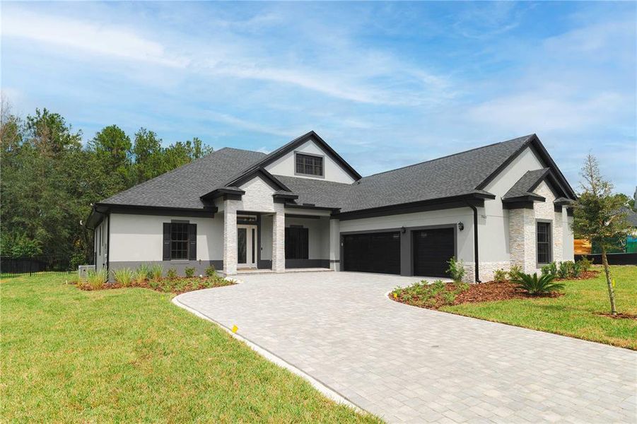 Front exterior of a new home in , Brooksville, FL, highlighting curb appeal (Image 2).
