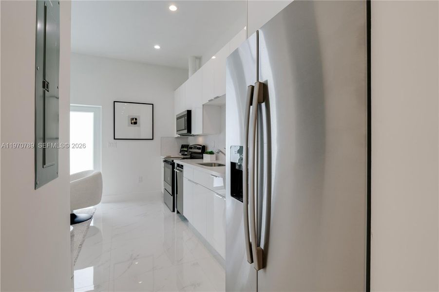 Furnished interior view inside a new home in , Miami (Image 8). Furnished interior view inside a new home in , Miami (Image 8).