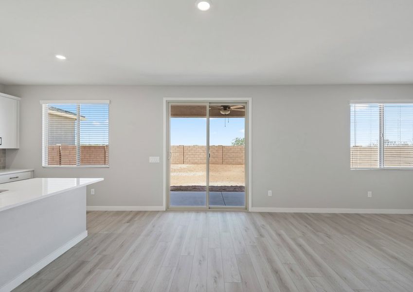 The living area is filled with natural lighting.