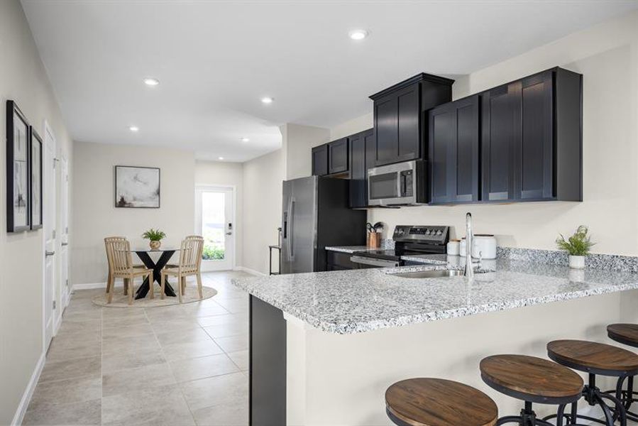 Representative furnished interior of a home built from the Flamingo Exterior Home by Ryan Homes in Edison Pointe, Daytona Beach (Image 3).