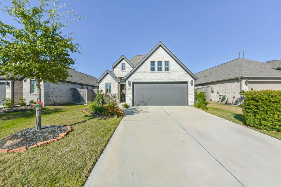 Front exterior of a new home in , Katy, TX, highlighting curb appeal (Image 2). Front exterior of a new home in , Katy, TX, highlighting curb appeal (Image 2).