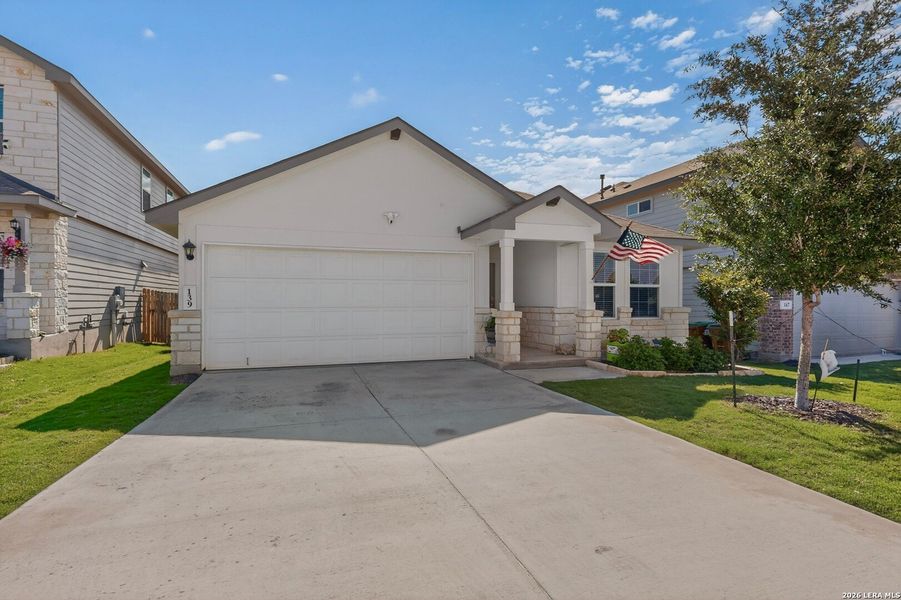 Front exterior of a new home in Redbird Ranch, San Antonio, TX, highlighting curb appeal (Image 1). Front exterior of a new home in Redbird Ranch, San Antonio, TX, highlighting curb appeal (Image 1).