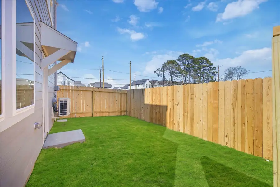 Exterior details and patio area of a home in Pinehaven, Houston (Image 2). Exterior details and patio area of a home in Pinehaven, Houston (Image 2).
