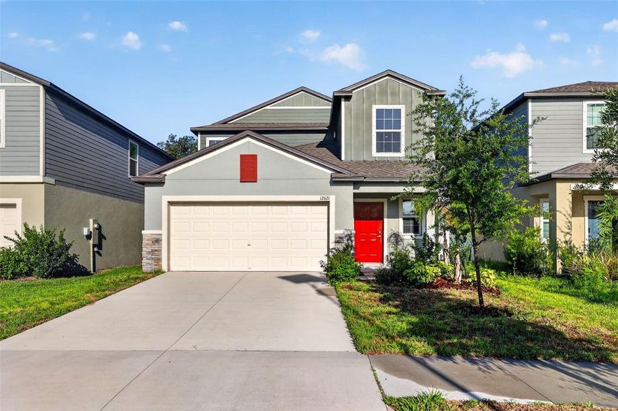 Front exterior of a new home in , Riverview, FL, highlighting curb appeal (Image 22).