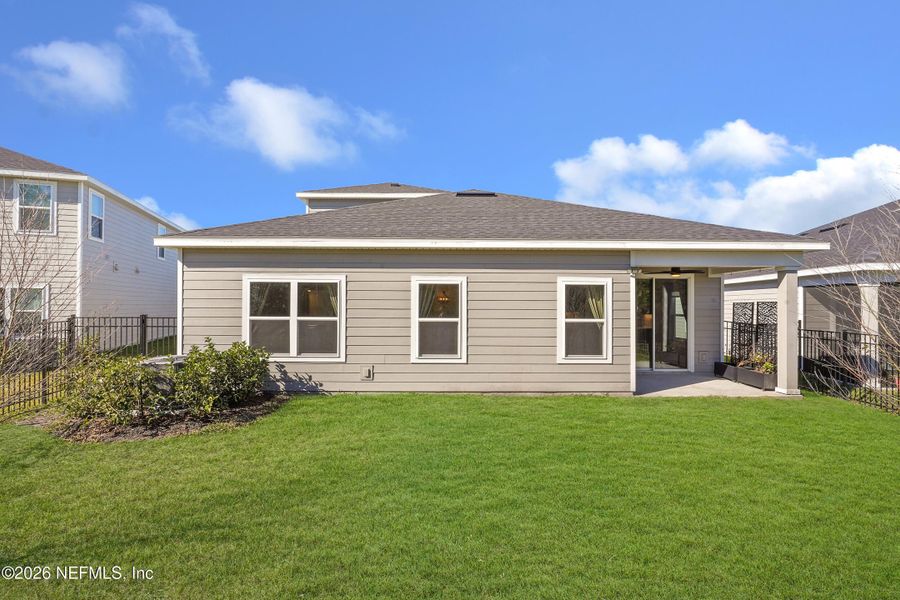 Exterior details and patio area of a home in Seminole Palms Single-Family Homes, Palm Coast (Image 27).