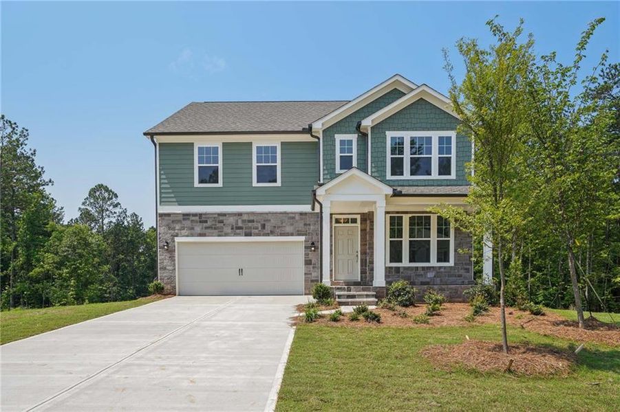Front exterior of a new home in , Locust Grove, GA, highlighting curb appeal (Image 2).