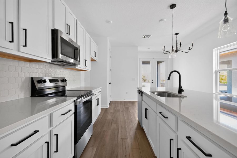 Furnished interior view inside a new home in Catamaran Cove, Rockledge (Image 7).