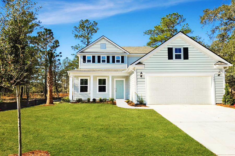 Front exterior of a new home in Solserra, Shallotte, NC, highlighting curb appeal (Image 18).