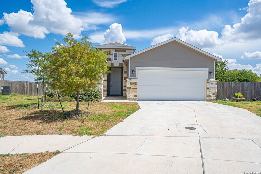 Front exterior of a new home in Hannah Heights, Seguin, TX, highlighting curb appeal (Image 19).