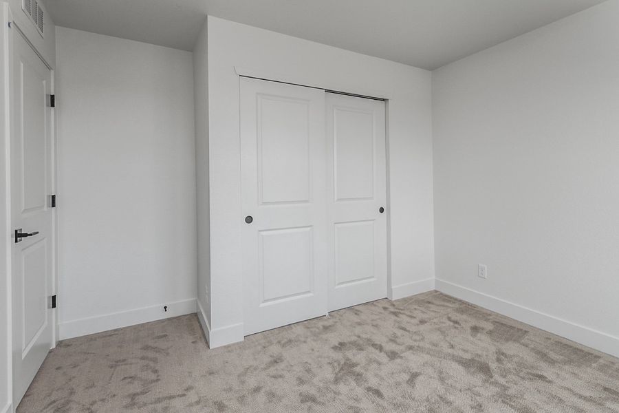 Representative unfurnished interior of a home built from the Sage by Hartford Homes in Bloom, Fort Collins (Image 28).