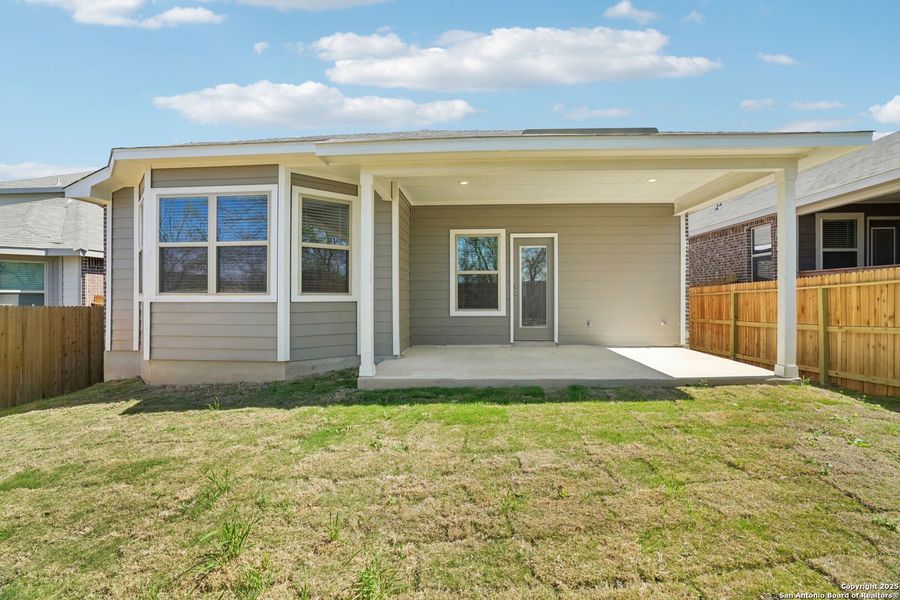 Front exterior of a new home in Comanche Ridge, San Antonio, TX, highlighting curb appeal (Image 19). Front exterior of a new home in Comanche Ridge, San Antonio, TX, highlighting curb appeal (Image 19).