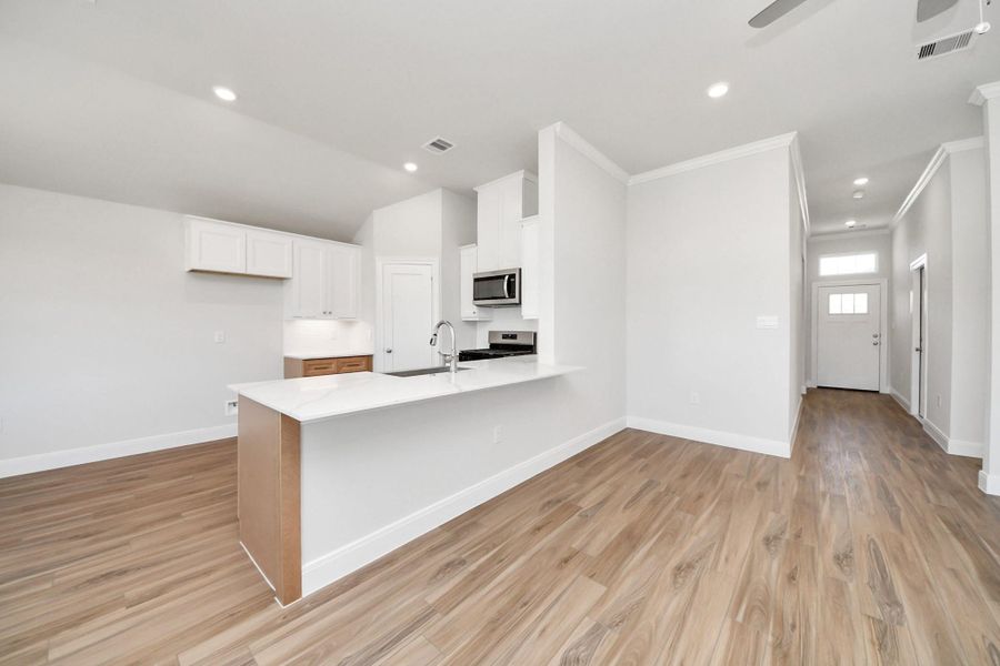 Furnished interior view inside a new home in Grand Oaks Reserve, Cleveland (Image 7).