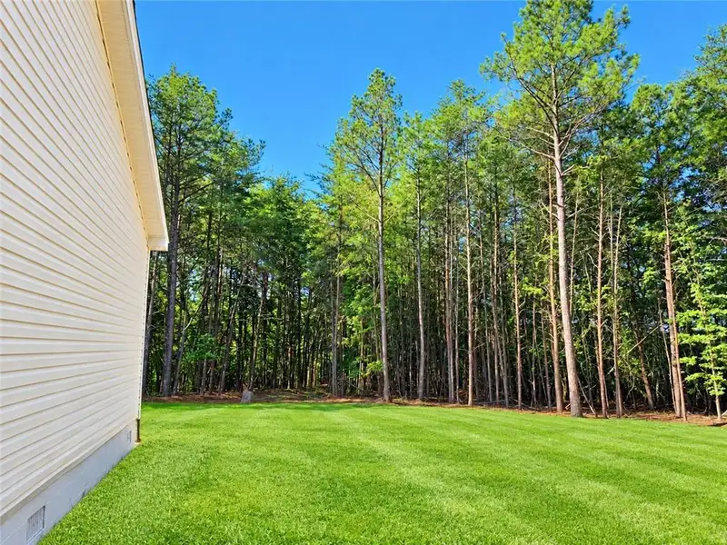 Exterior details and patio area of a home in , Gainesville (Image 3).