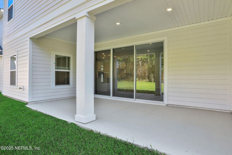 Exterior details and patio area of a home in Silver Landing at SilverLeaf, St. Augustine (Image 24). Exterior details and patio area of a home in Silver Landing at SilverLeaf, St. Augustine (Image 24).