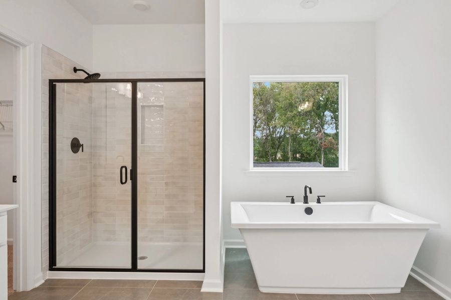 Primary Bath featuring the AW Collection® Rosemary - Organic textures meet bold design. Primary Bath featuring the AW Collection® Rosemary - Organic textures meet bold design.