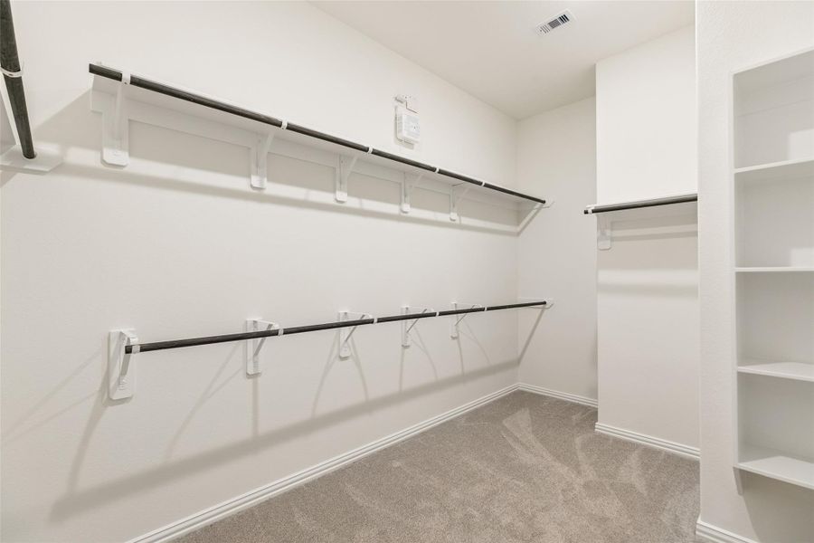 Furnished interior view inside a new home in Creekhaven, Iowa Colony (Image 5).