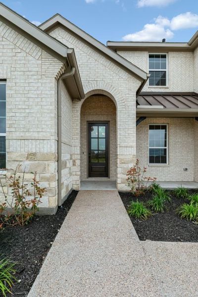 Exterior details and patio area of a home in Milrany Ranch, Melissa (Image 4).