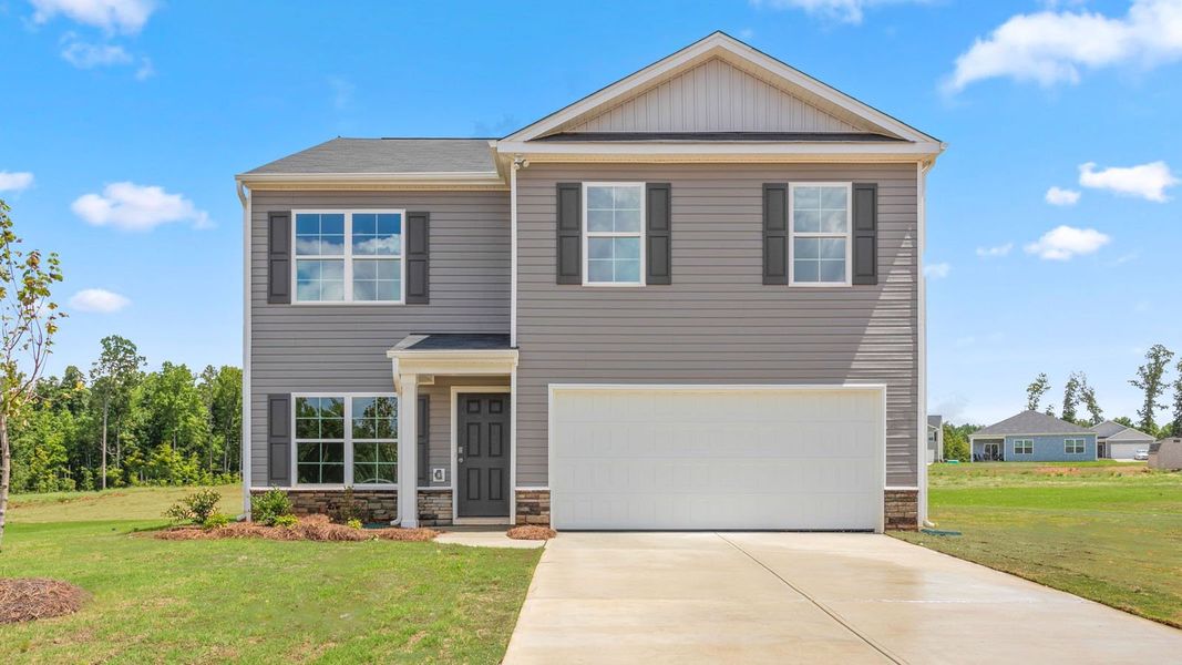Front exterior of a new home in Mount Hope Estates, Winston-Salem, NC, highlighting curb appeal (Image 1). Front exterior of a new home in Mount Hope Estates, Winston-Salem, NC, highlighting curb appeal (Image 1).