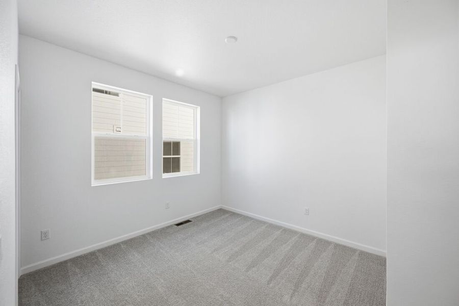 Spacious, unfurnished interior of a new home in Macanta, Castle Rock (Image 22).