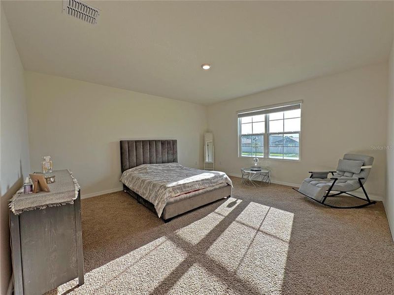 Furnished interior view inside a new home in , Harmony (Image 33).