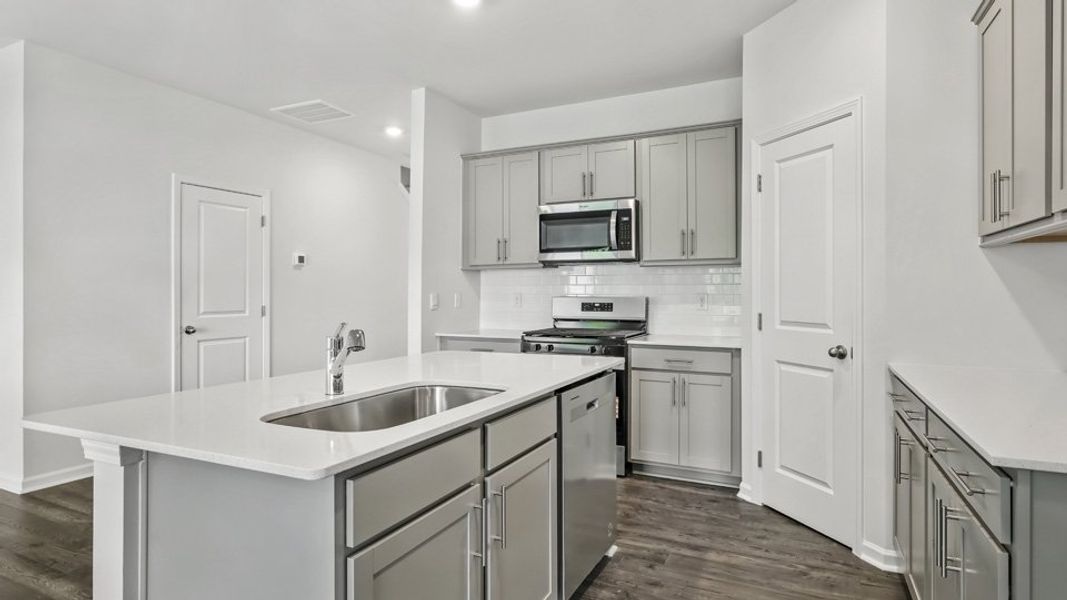 Furnished interior view inside a new home in The Gables at Edinborough Townes, Gibsonville (Image 6).