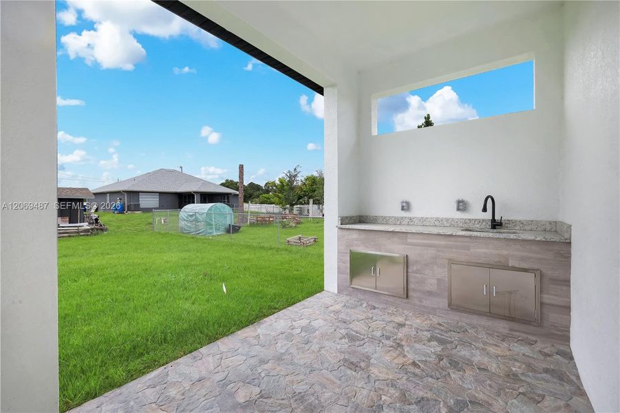 Exterior details and patio area of a home in , Lehigh Acres (Image 3).