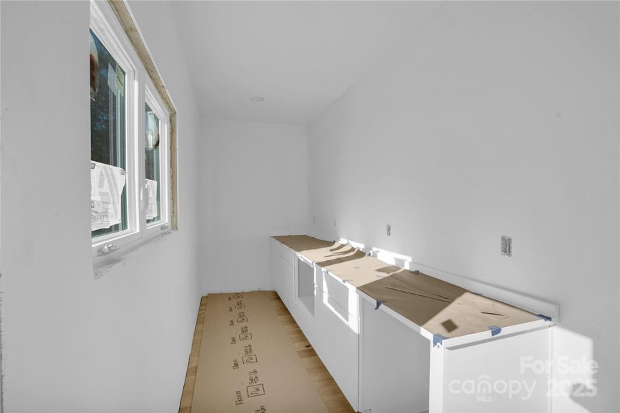 Butler's pantry will have a beverage fridge and microwave drawer