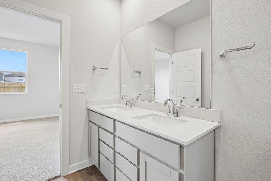 Furnished interior view inside a new home in Stallion Run, Buda (Image 13).