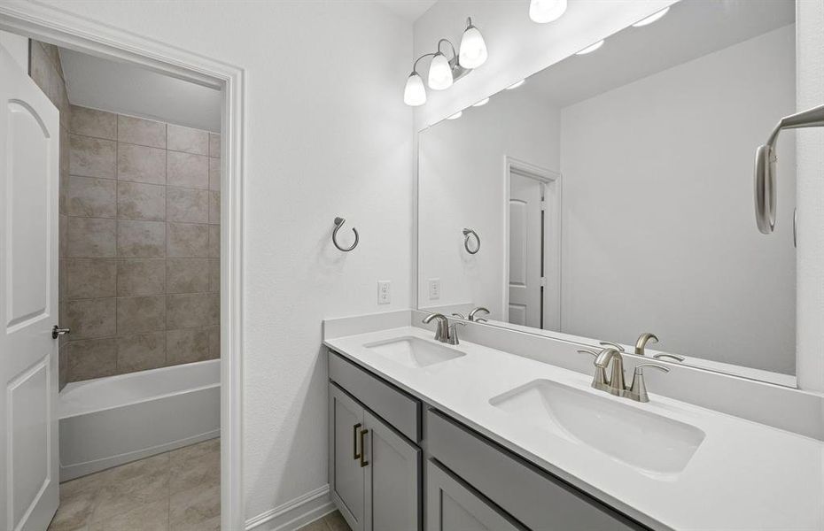 Secondary bathroom with double vanity