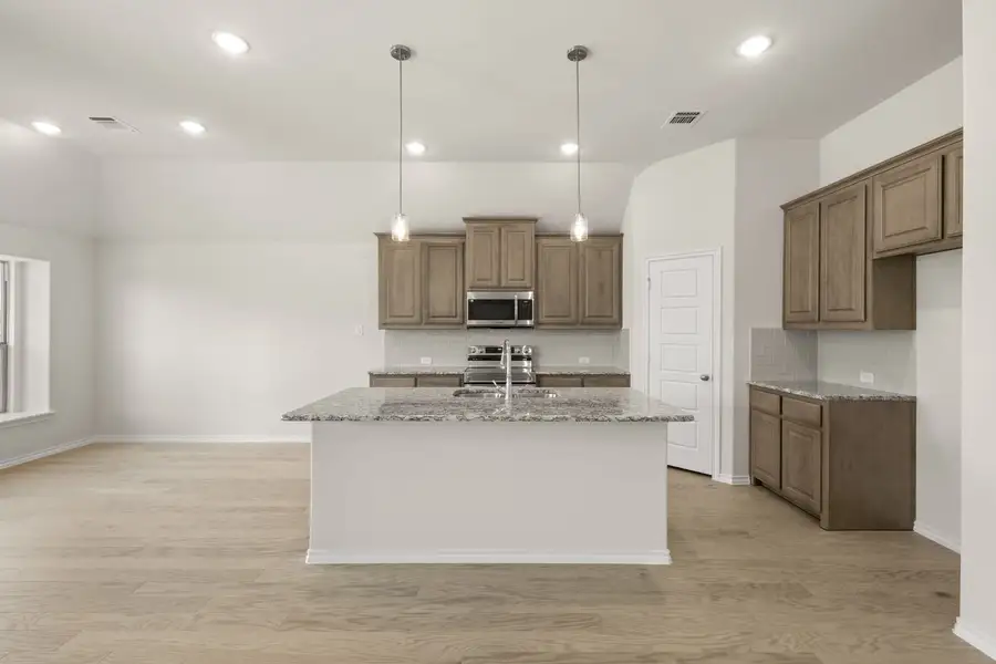 Furnished interior view inside a new home in Summer Crest, Fort Worth (Image 7). Furnished interior view inside a new home in Summer Crest, Fort Worth (Image 7).