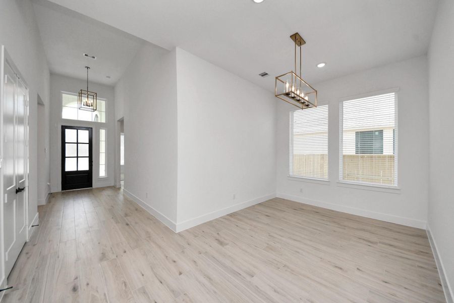 Spacious, unfurnished interior of a new home in Meridiana Courtyard Collection, Manvel (Image 20).