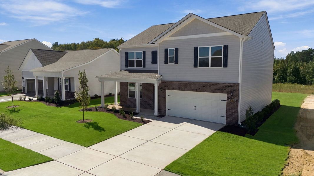 Front exterior of a new home in West New Bern, New Bern, NC, highlighting curb appeal (Image 2). Front exterior of a new home in West New Bern, New Bern, NC, highlighting curb appeal (Image 2).