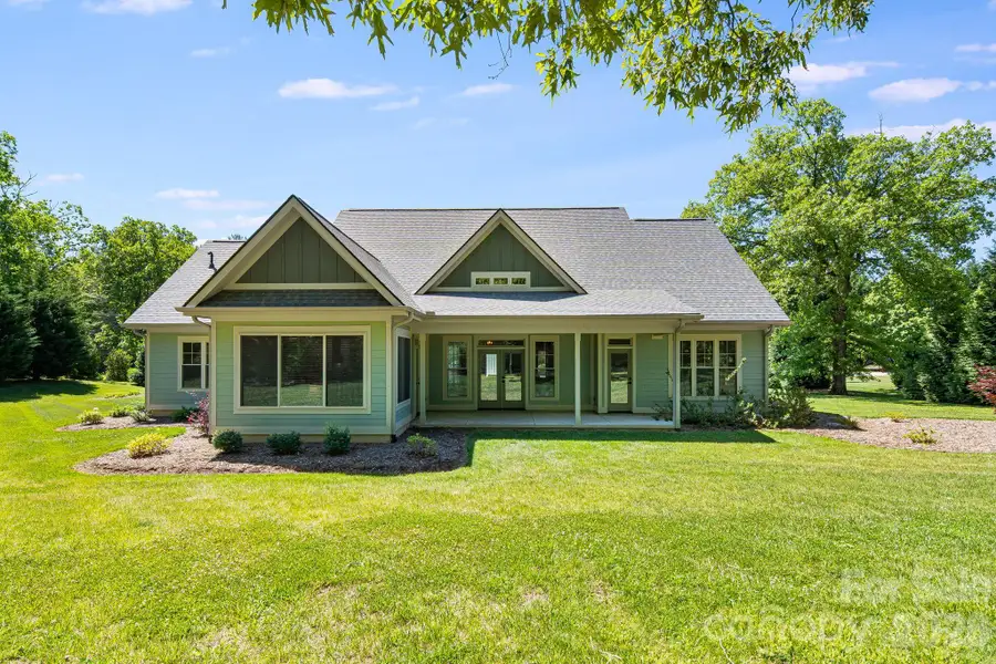 Exterior details and patio area of a home in , Flat Rock (Image 25).