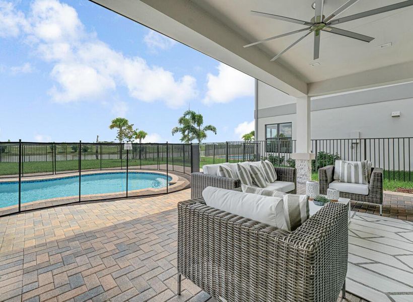 Exterior details and patio area of a home in Apex at Avenir, Palm Beach Gardens (Image 30).