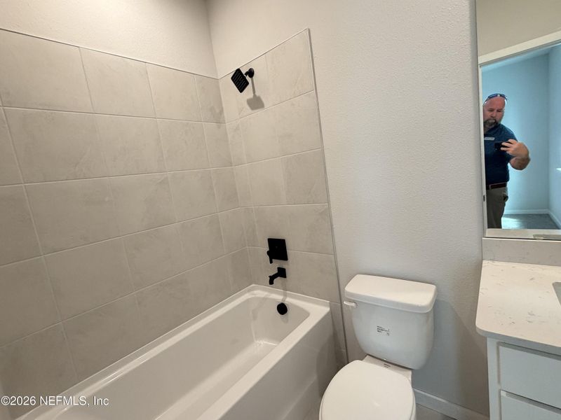 Furnished interior view inside a new home in Reserve East, Flagler Beach (Image 11).