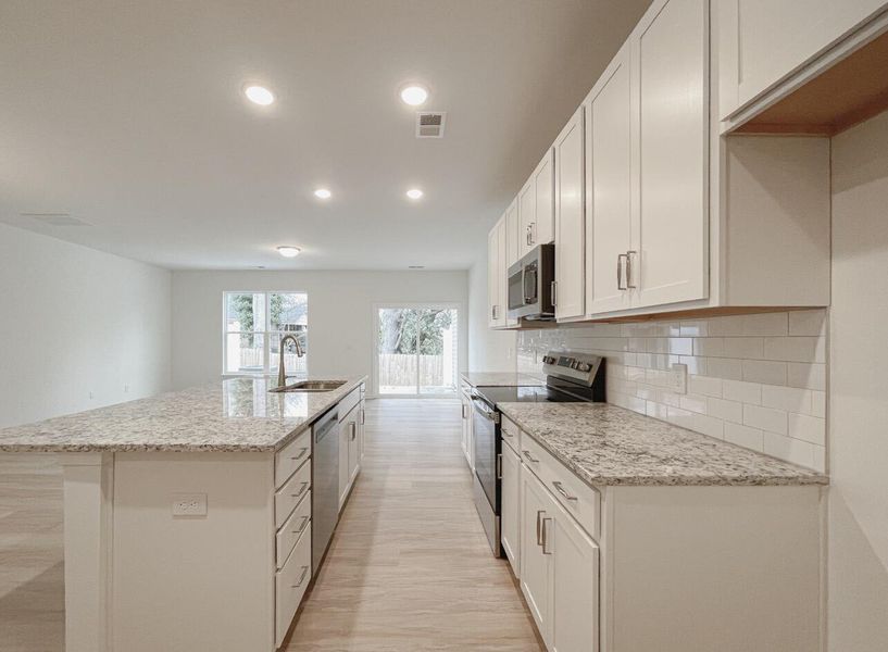Furnished interior view inside a new home in East Main Townes, Spartanburg (Image 7).