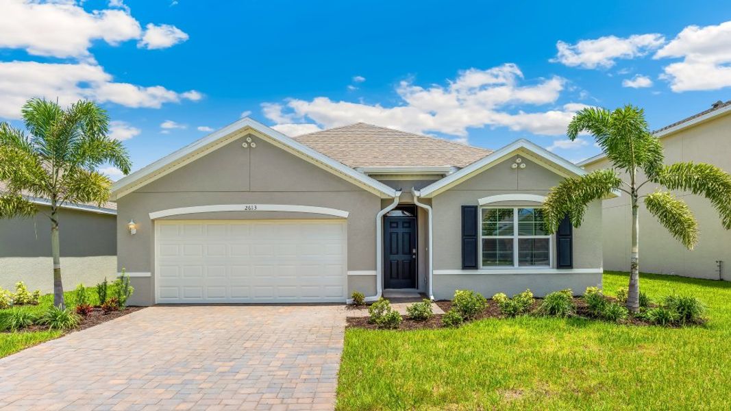 Representative exterior photo of a completed home built from the Cali by D.R. Horton in Coral Bay - Express & Tradition, North Fort Myers, FL (Image 1).