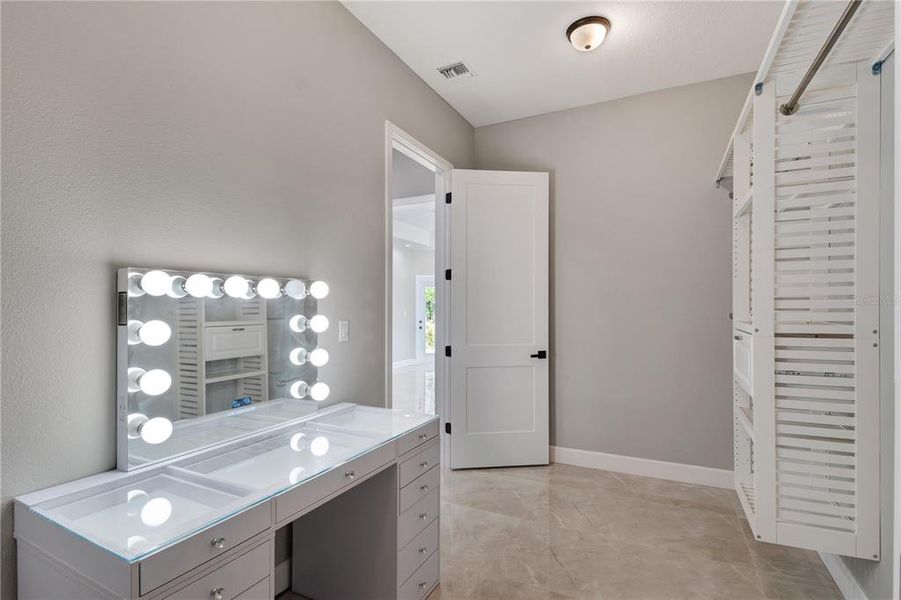 smart vanity in Hers master closet!