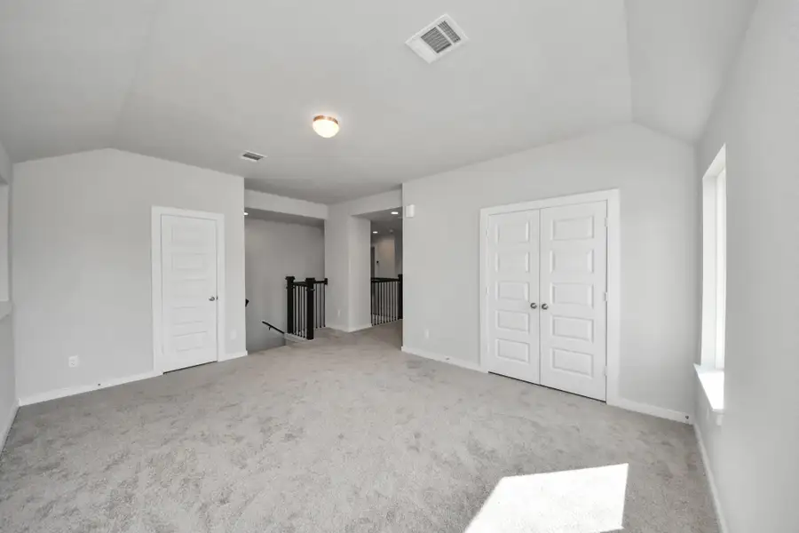 Come upstairs and enjoy a day of leisure in this fabulous game room! This is the perfect hangout spot or adult game room! Features plush carpet, high ceilings, custom paint and windows for plenty of natural light. Come upstairs and enjoy a day of leisure in this fabulous game room! This is the perfect hangout spot or adult game room! Features plush carpet, high ceilings, custom paint and windows for plenty of natural light.