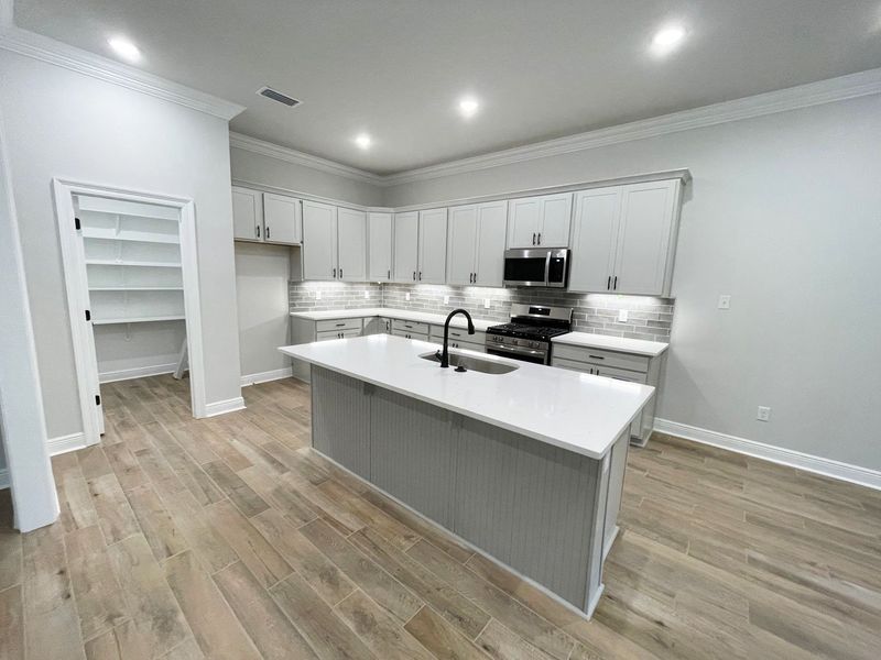 Furnished interior view inside a new home in Iron Rock, Cantonment (Image 4). Furnished interior view inside a new home in Iron Rock, Cantonment (Image 4).