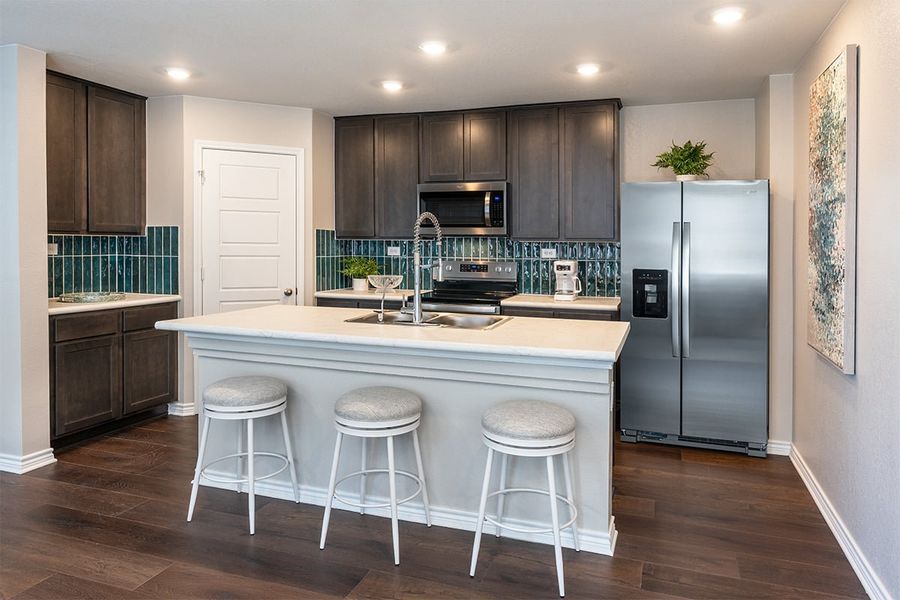 Representative furnished interior of a home built from the 1604 by KB Home in Spanish Trails, San Antonio (Image 6).