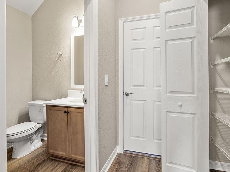 And, a downstairs powder room serves your guests.
