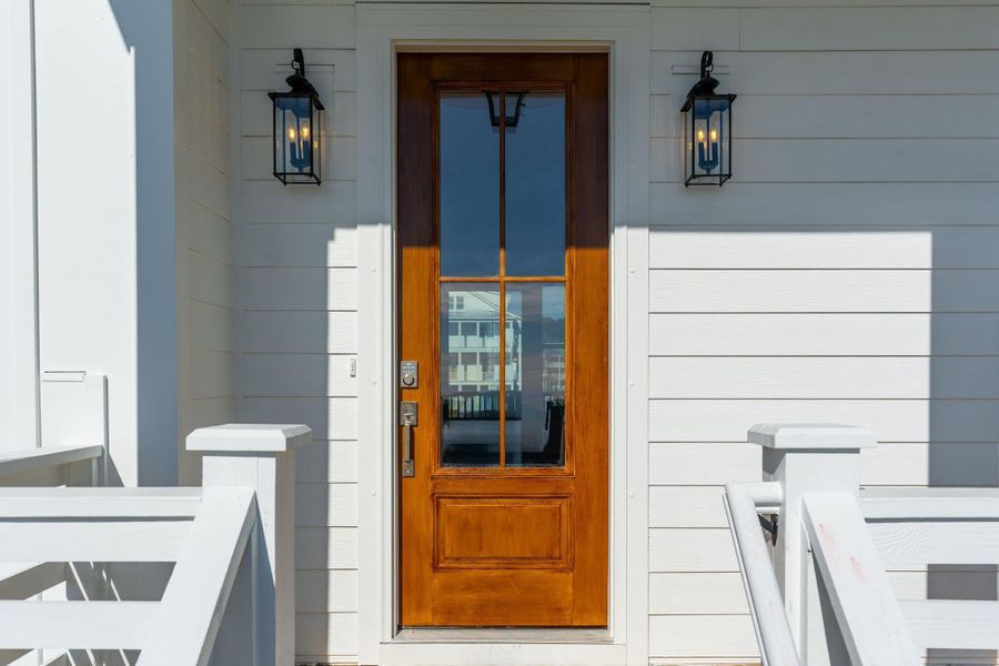 Exterior details and patio area of a home in Overlook at Copahee Sound, Awendaw (Image 32).