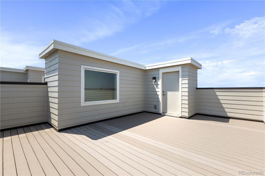 Front exterior of a new home in Dillon Pointe - Skyview, Broomfield, CO, highlighting curb appeal (Image 13).