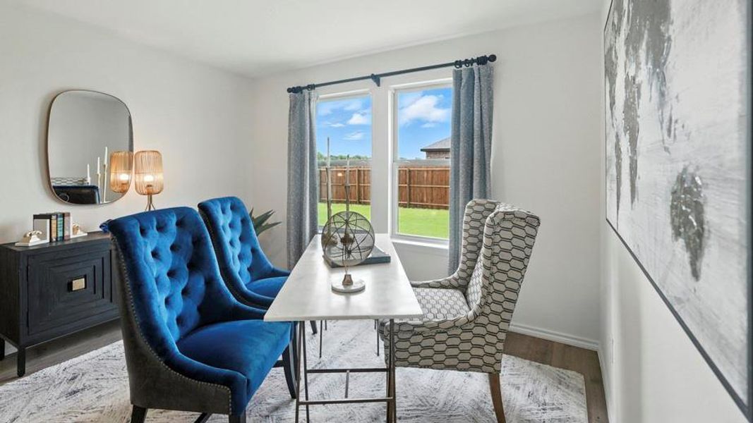 Office space featuring light wood-type flooring and baseboards Office space featuring light wood-type flooring and baseboards