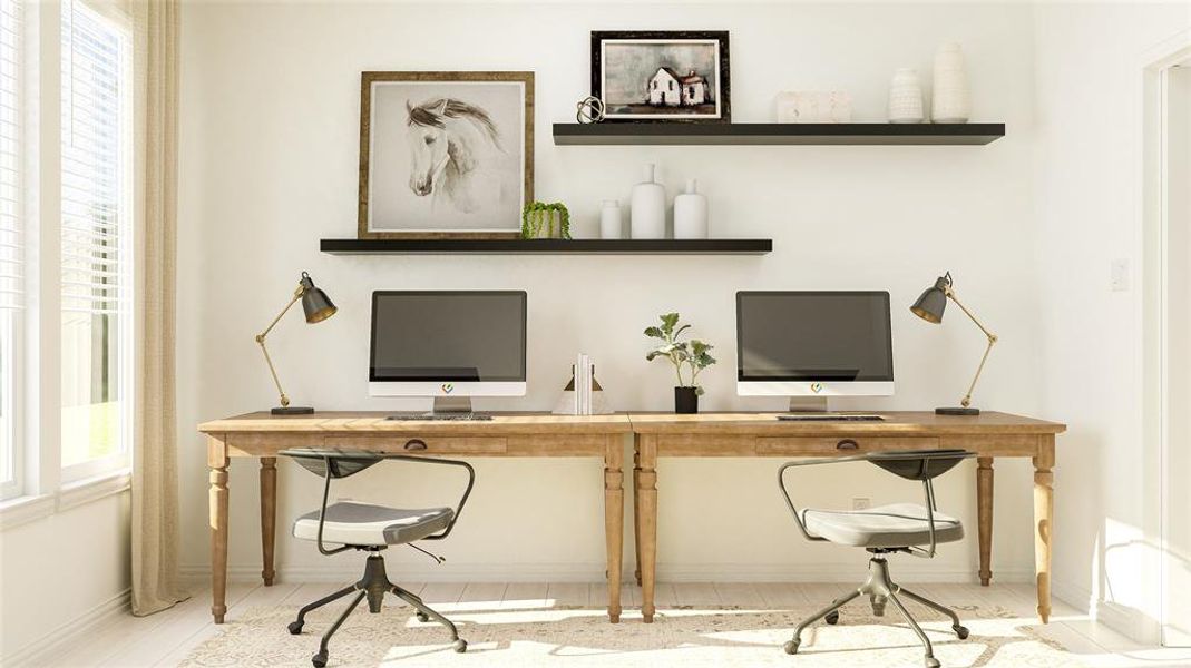 Office space featuring a wealth of natural light and hardwood / wood-style floors