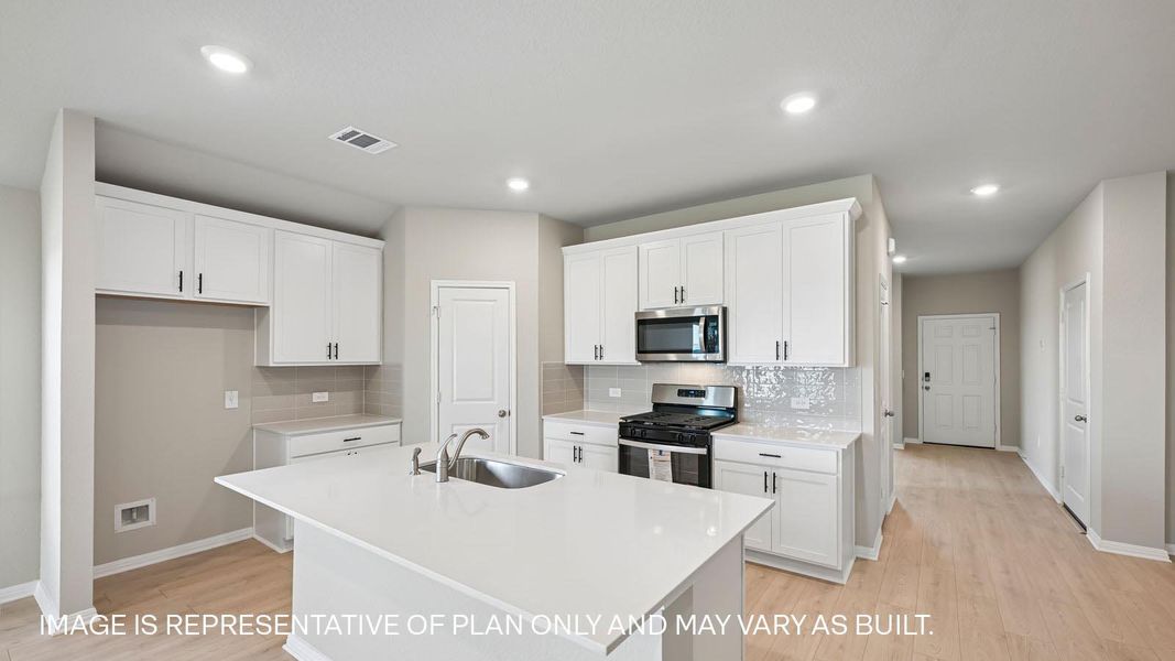 Furnished interior view inside a new home in Carillon, Manor (Image 8).